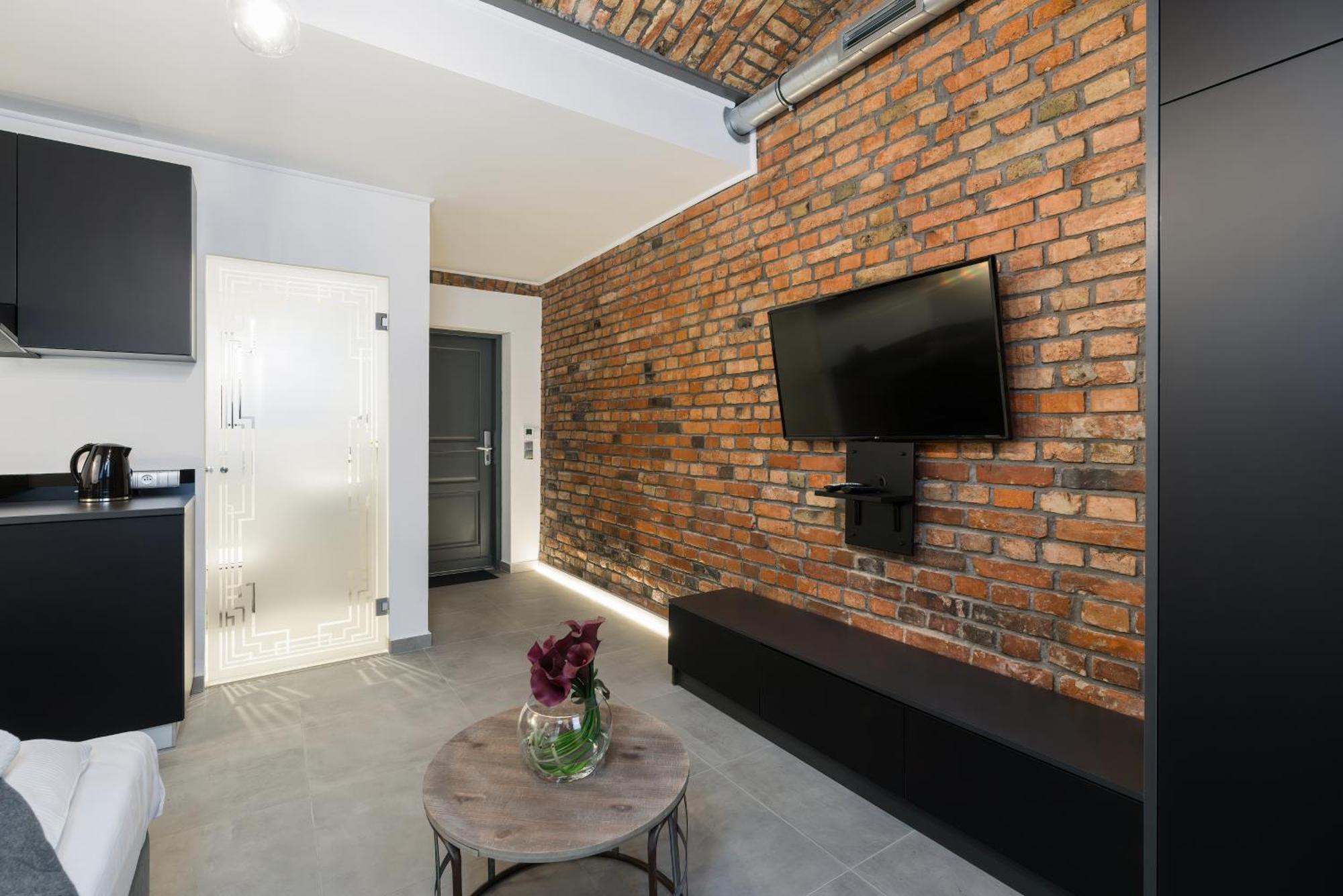Level -1 Loft Apartments City Center By Renters พอซนาน ภายนอก รูปภาพ