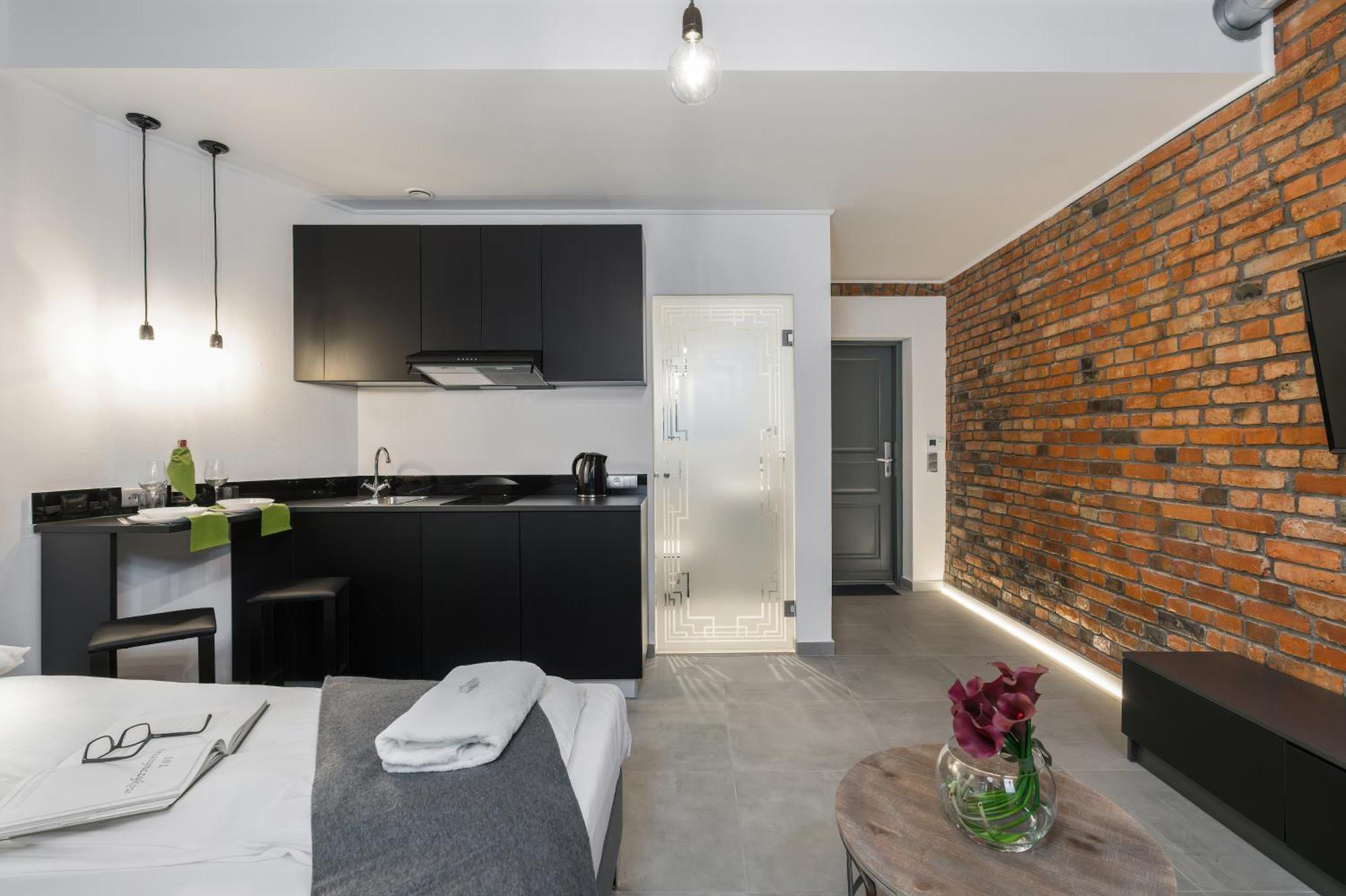 Level -1 Loft Apartments City Center By Renters พอซนาน ภายนอก รูปภาพ