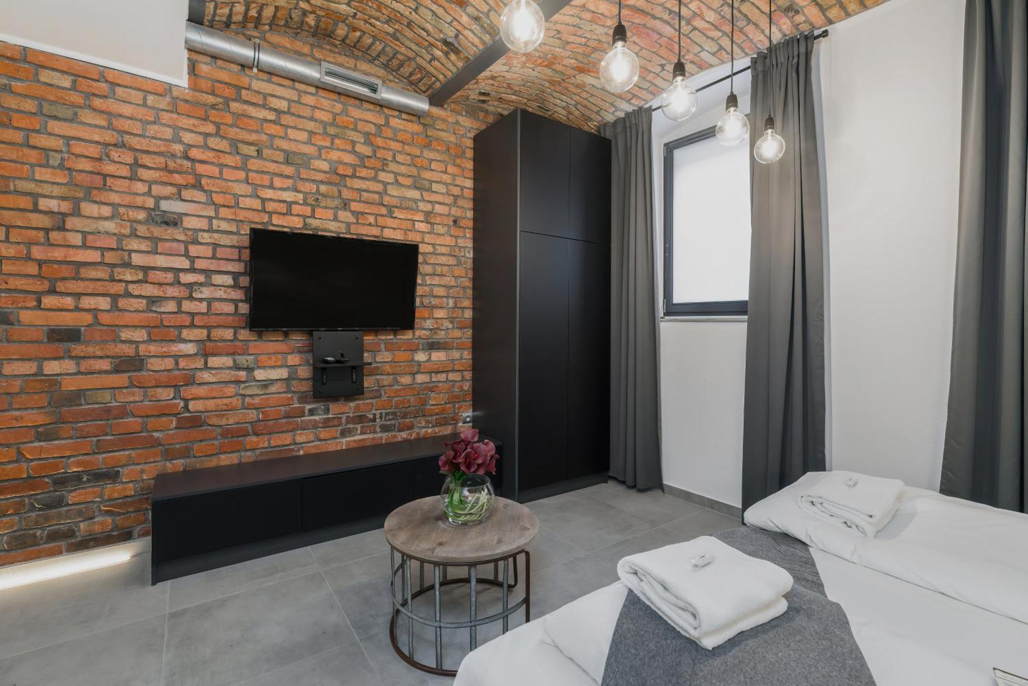 Level -1 Loft Apartments City Center By Renters พอซนาน ภายนอก รูปภาพ